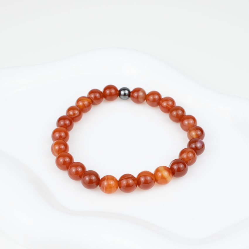 Bransoletka Karneol jednolita na gumce.png